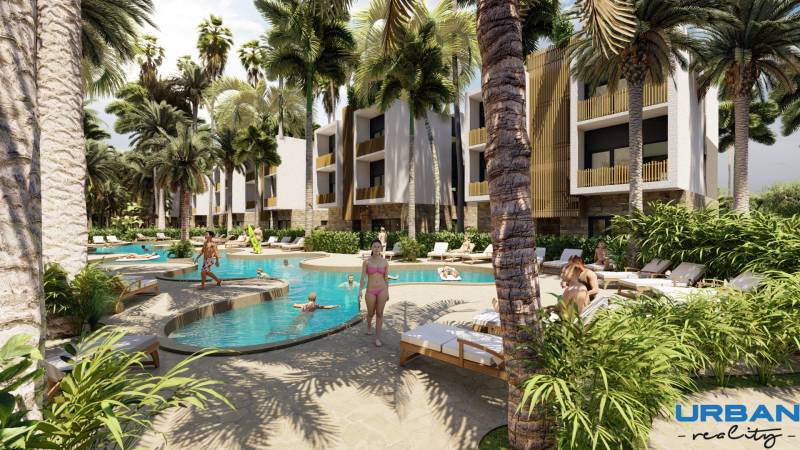 A07 poolside relaxation with palms and greenery vela zanzibar residences.jpg