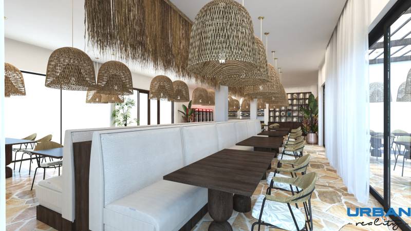african-inspired breakfast area with rattan details and lush greenery luxury residences vela zanzibar.jpg