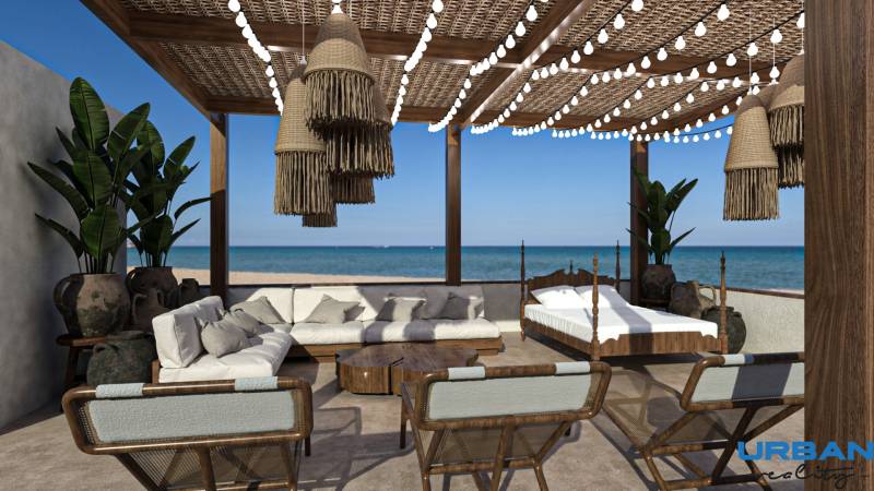 Terasová miestnosť s dreveným prístreškom, posedením a výhľadom na pláž v Paje.